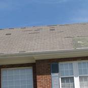 #1 Shingle tabs in various areas have been completely removed during a high wind thunderstorm.